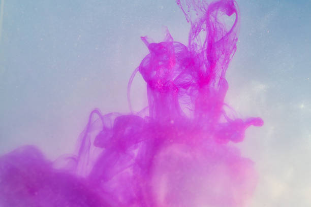 istock inked paint in water purple paint explosion in water 1139132422