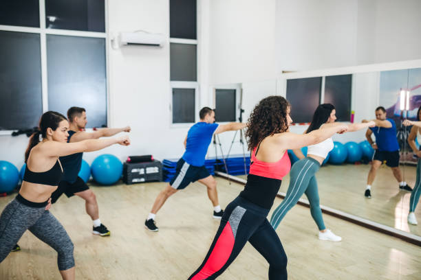 istock Group of people exercising in a gym 1139133055