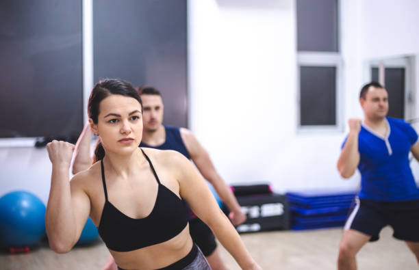 istock Group of people exercising in a gym 1139133210