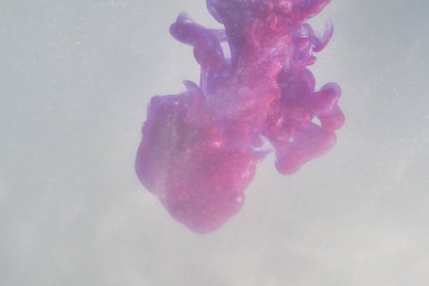 istock inked paint in water purple paint explosion in water 1139133872