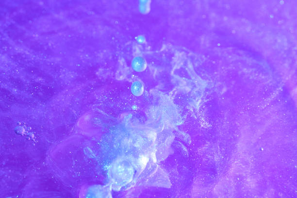 istock paint brilliant blue purple in water 1139133878