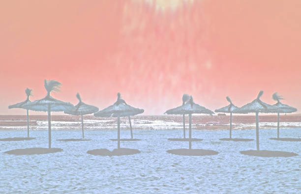 Vacation on the sand beach concept. The Sun symbol, sunshine drawing into the sand on the beach at Rayong, Thailand
