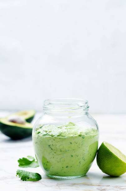 istock Greek yogurt avocado cilantro lime dressing with avocado slices 1139135643