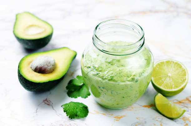 istock Greek yogurt avocado cilantro lime dressing with avocado slices 1139135648