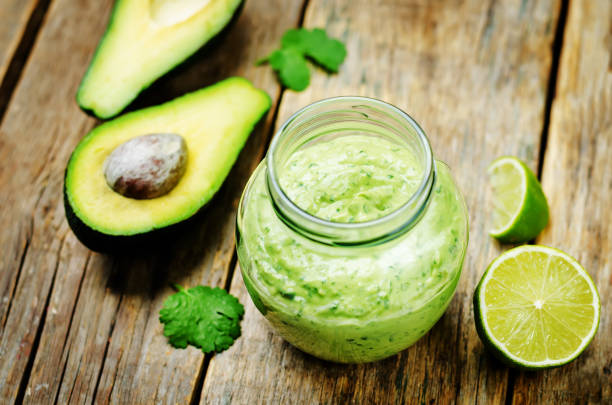 istock Greek yogurt avocado cilantro lime dressing with avocado slices 1139135649
