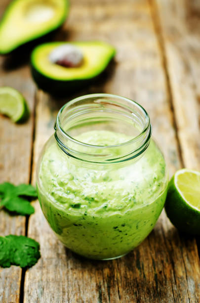 istock Greek yogurt avocado cilantro lime dressing with avocado slices 1139136175