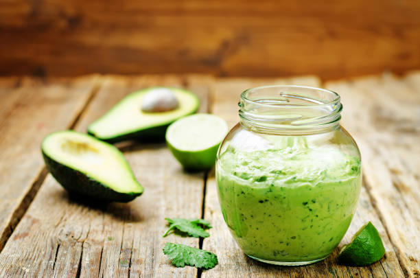 istock Greek yogurt avocado cilantro lime dressing with avocado slices 1139136186