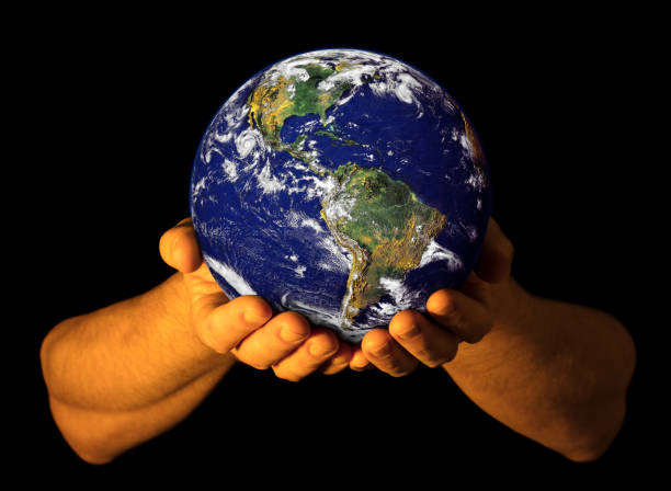 istock Hands holding the Earth with North America visible 1139141566