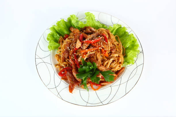 istock Meat baked on a plate, Chinese cuisine, on a light background. 1139141990
