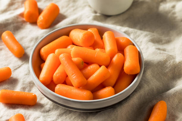 istock Raw Organic Orange Baby Carrots 1139145040