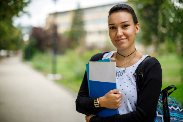 istock Cute female student outdoors 1139145105