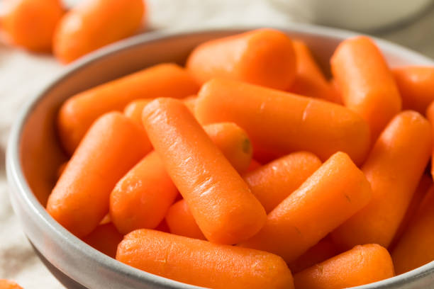 istock Raw Organic Orange Baby Carrots 1139145275