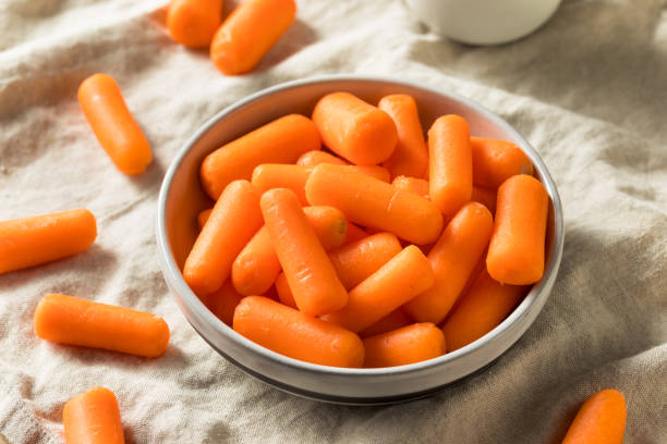 istock Raw Organic Orange Baby Carrots 1139146055