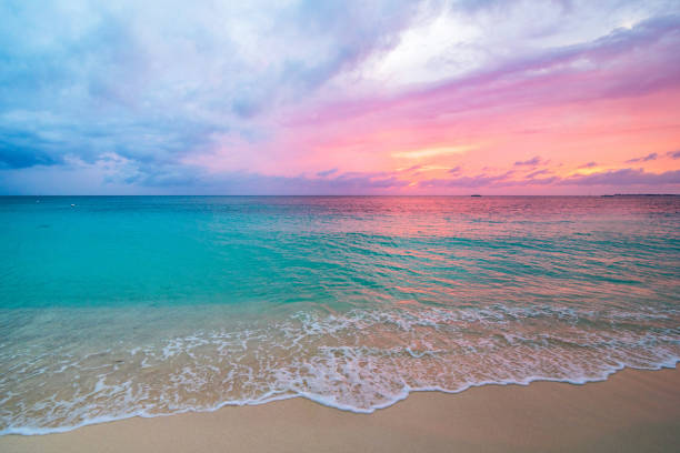 Pink Sunset Dramatic Sky grand cayman stock pictures, royalty-free photos & images
