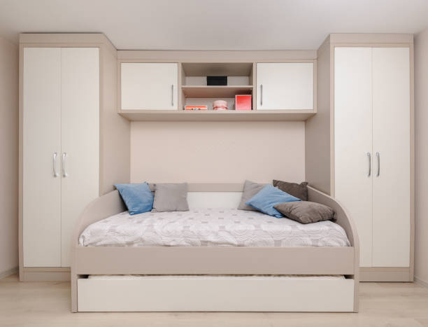 istock Modern bedroom with white wardrobe and double bed 1139151604