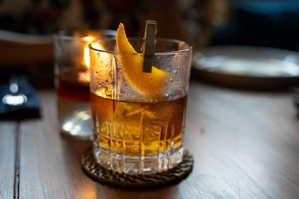 istock Old fashioned cocktail served in a whiskey glass at the restaurant. Copy space 1139161678