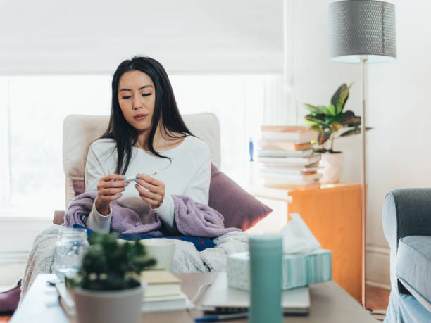 istock Young Asian woman sick at home 1139164977