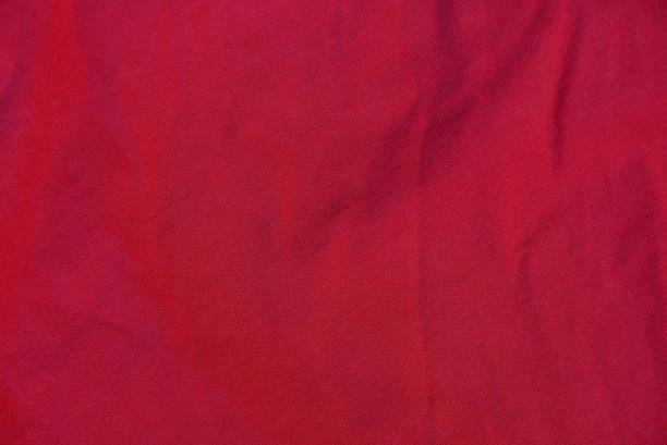 istock red fabric texture from a piece of crumpled wool 1139166941