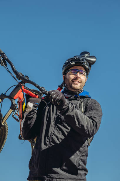 portrait of caucasian man biking - ontario spring bicycle city life imagens e fotografias de stock