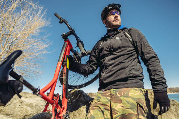 portrait of caucasian man biking - ontario spring bicycle city life imagens e fotografias de stock