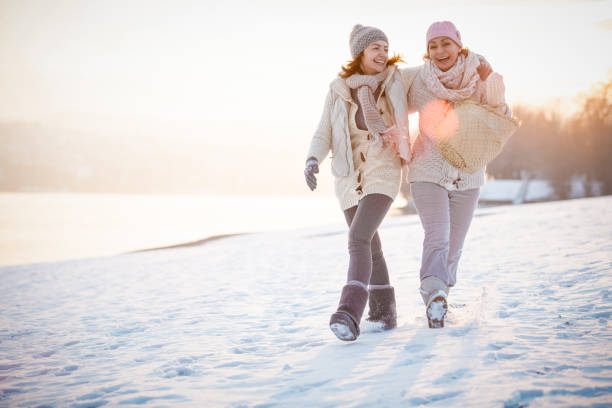 istock Happy women enjoying winter 1139177485