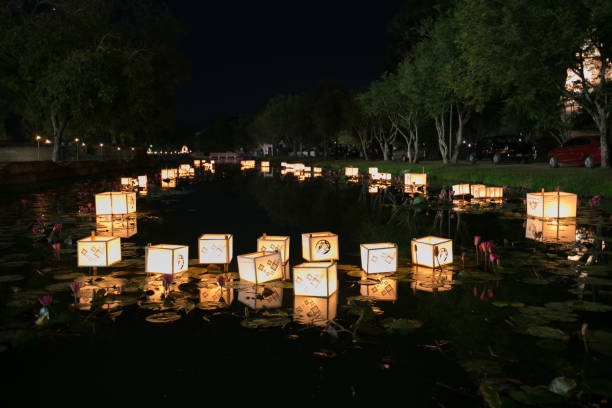 istock Handmade paper lanterns floating in the water 1139179539