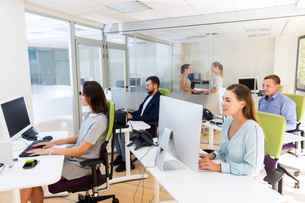 istock Coworkers working together in office 1139182076