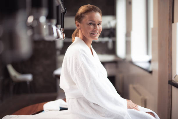 istock Joyful middle aged woman resting at wellness center 1139182820