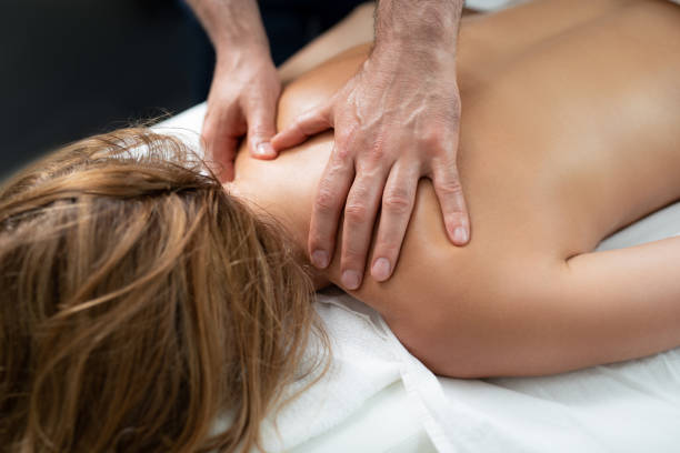 istock Professional masseur doing relaxing massage on lady back 1139182866
