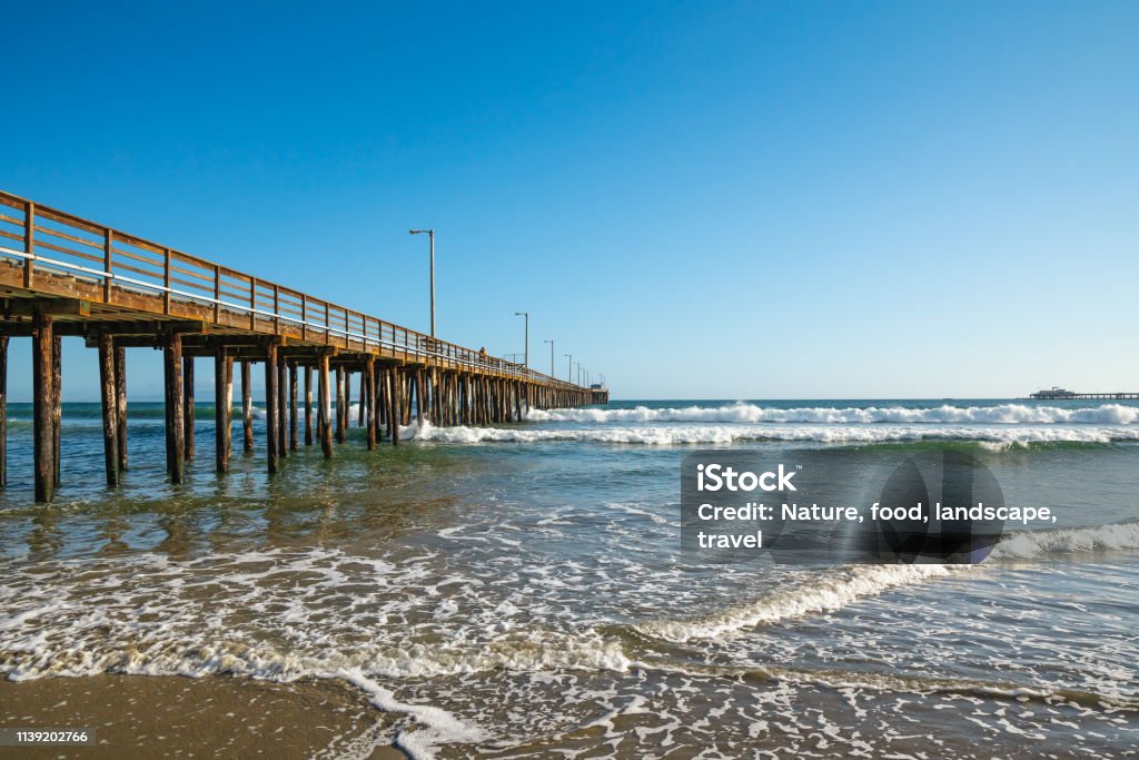 Pacific Ocean and Long Wooden Pier Avila Beach - California Stock Photo