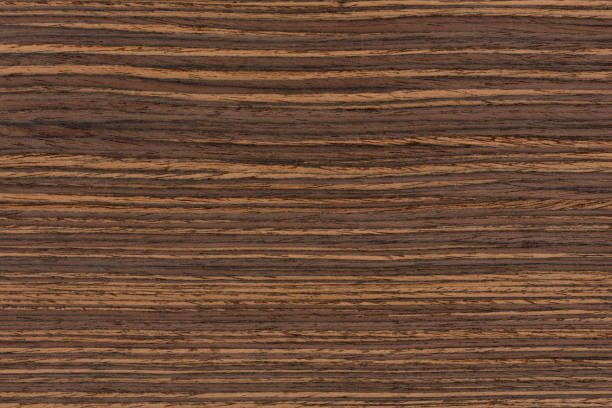 istock Texture of dark ebony veneer. Natural ebony veneer background. 1139212487