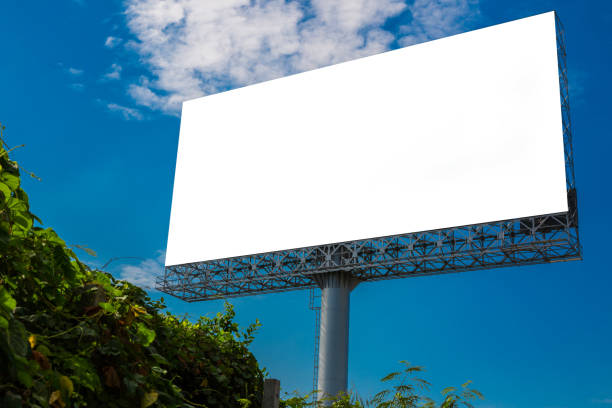 istock Blank billboard under clouds and blue sky - can advertisement for display or montage product and business 1139213915