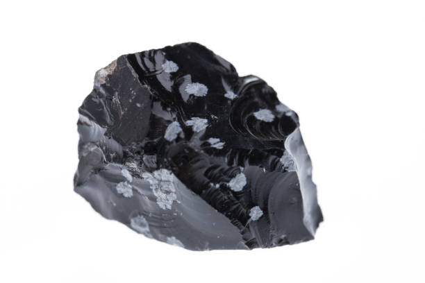 istock Minerals: Raw snowflake obsidian isolated on white background 1139214887