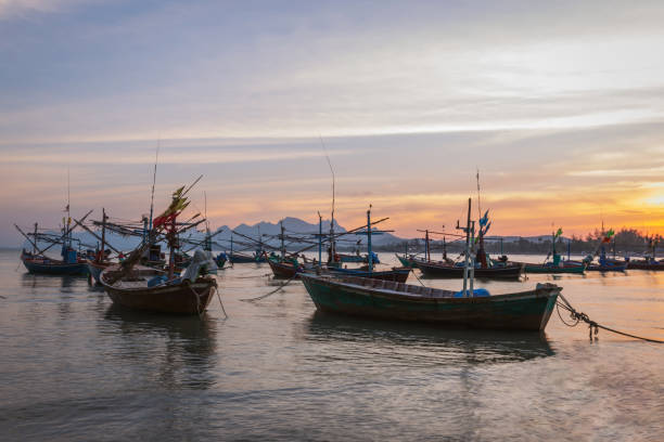 istock fishing boat and waves on the sea. 1139215511