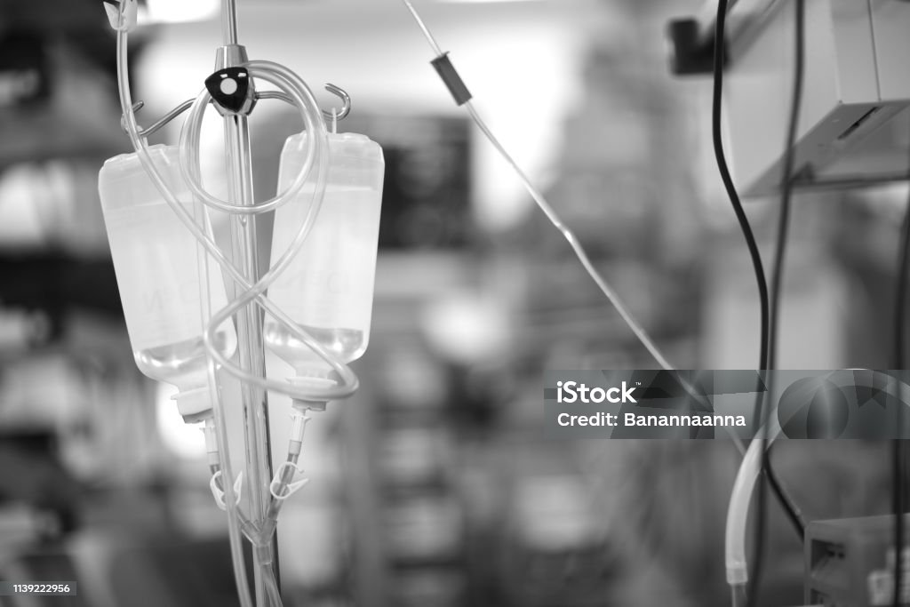 Drug for intravenous administration A tripod with infusion solutions in the operating room Catheter Stock Photo