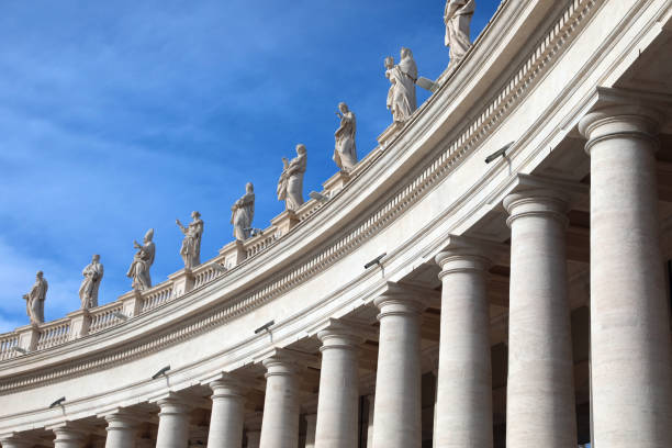 white columns and statues above the colonnade of the architect B