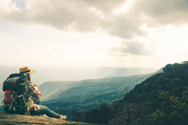 istock Side View Of Backpacker Looking At Mountains Against Sky 1139232932