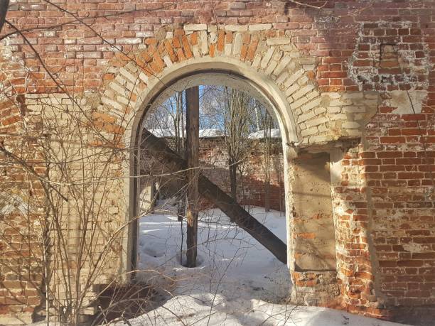 istock abandoned and destroyed red brick building in winter. 1139233611