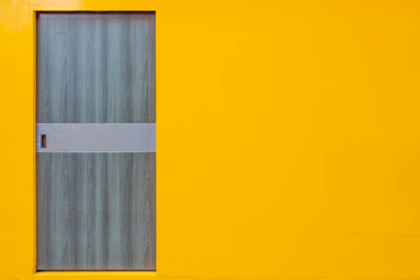 istock Yellow wall blue door 1139235769