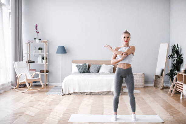 istock Young woman exercise at home healthy lifestyle. 1139237976