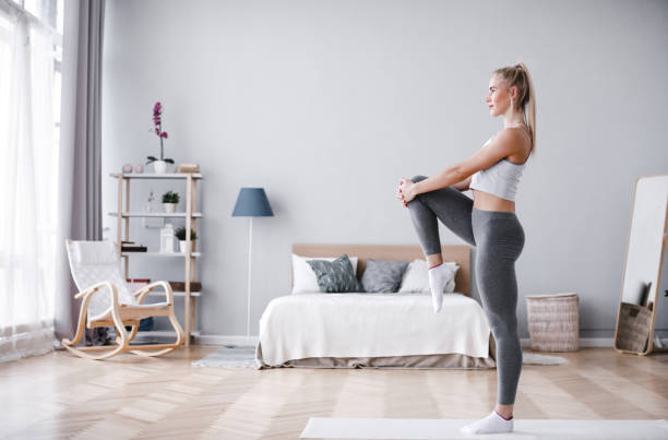 istock Fit sportswoman exercising and training at home. 1139238369