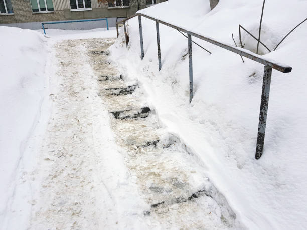 istock Dangerous slippery stairs and old handrail in winter 1139245268
