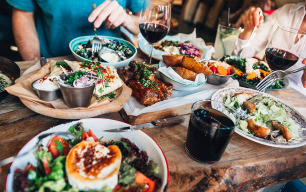 istock Enjoying lunch with friends 1139245412