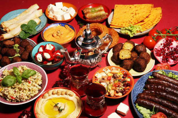 istock Middle eastern or arabic dishes and assorted meze, concrete rustic background. Falafel. Turkish Dessert Baklava with pistachio. Halal food. Lebanese cuisine 1139247148