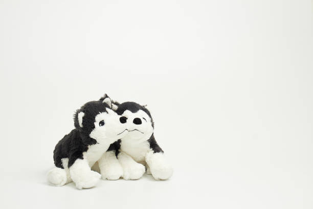 istock Cute dog doll isolated on white background. (with free space for text) 1139247592