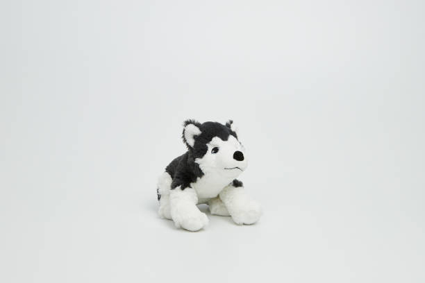 istock Cute dog doll isolated on white background. (with free space for text) 1139247631