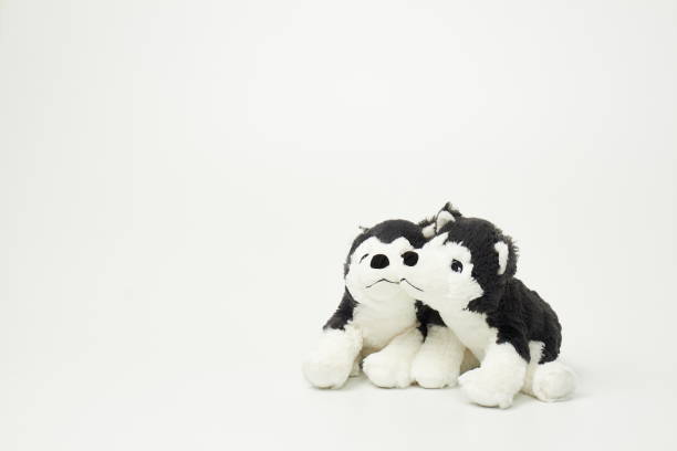 istock Cute dog doll isolated on white background. (with free space for text) 1139247681