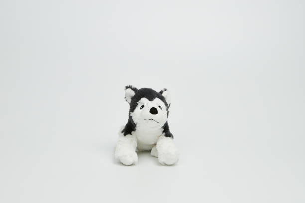 istock Cute dog doll isolated on white background. (with free space for text) 1139247716