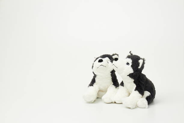 istock Cute dog doll isolated on white background. (with free space for text) 1139248267