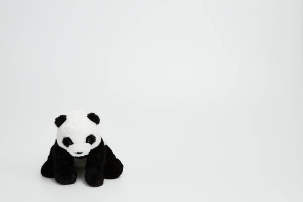 istock Cute panda doll isolated on white background. (with free space for text) 1139248286